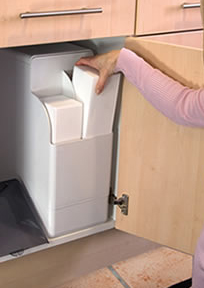 inserting salt into a water softener
